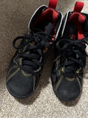 Jordan Kids Black and Red Sneakers with Yellow Stitching